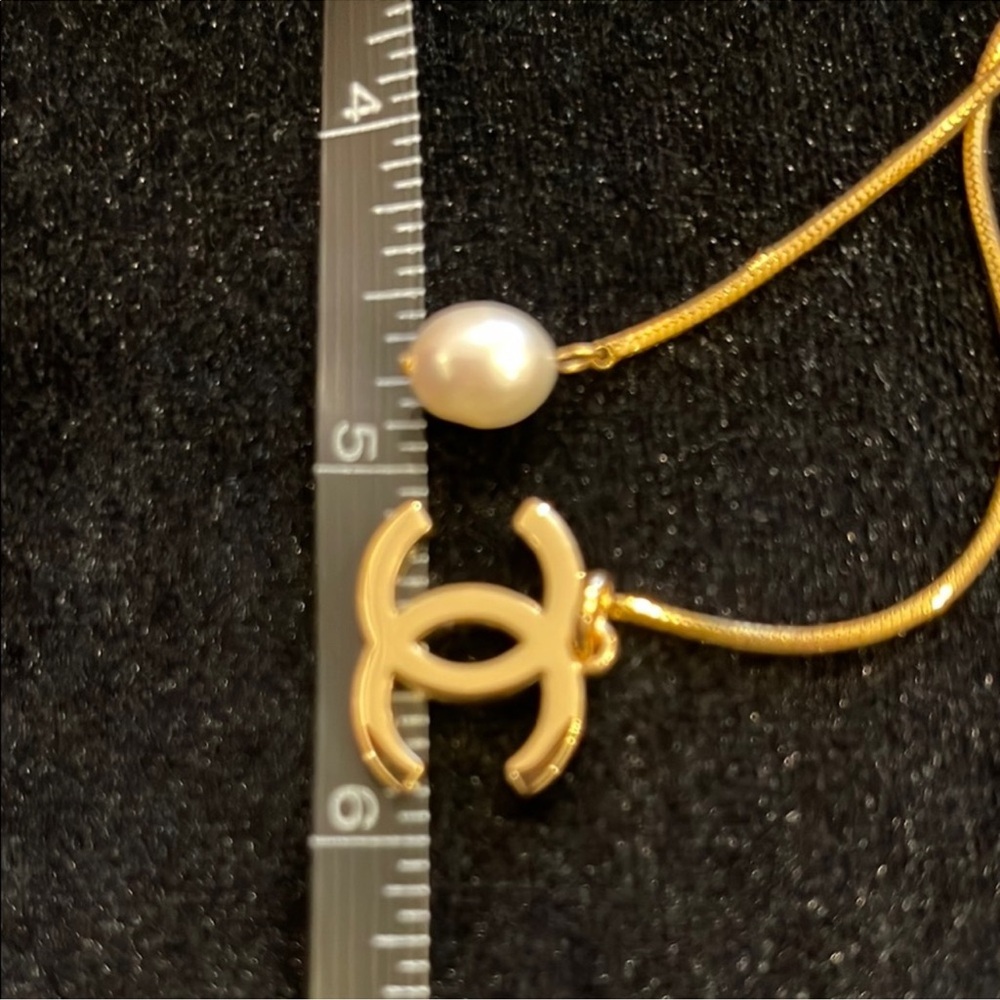 CHANEL Gold Necklace with Pearl and Logo Charm - Picture 10 of 10